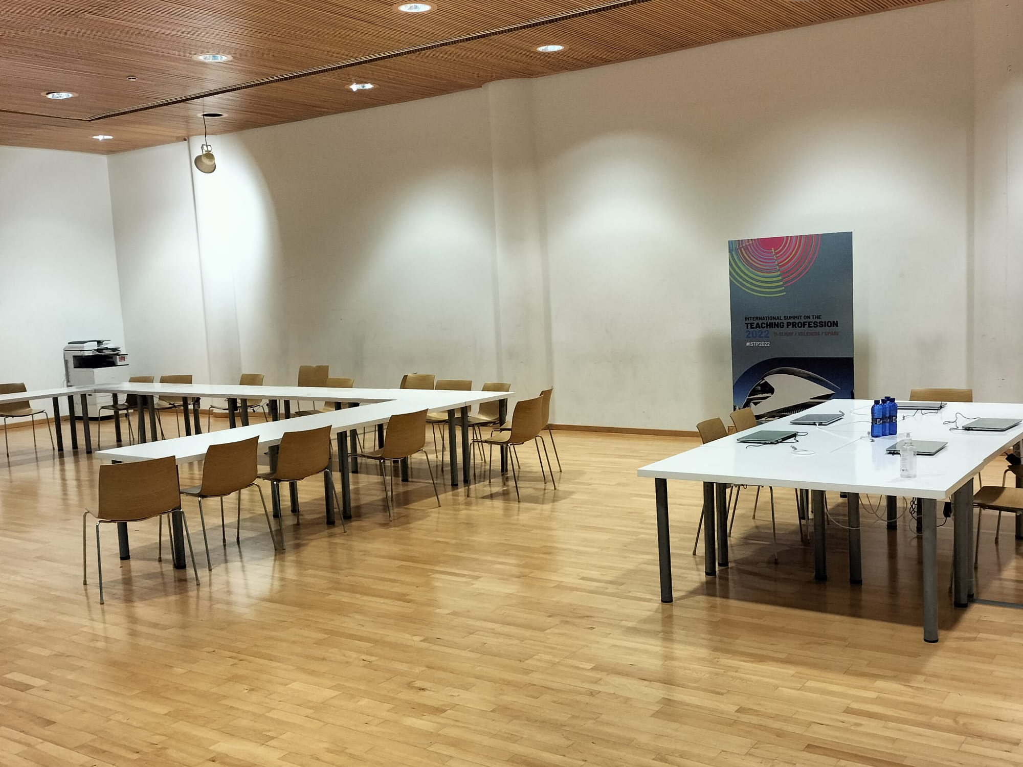 A room with tables and chairs
